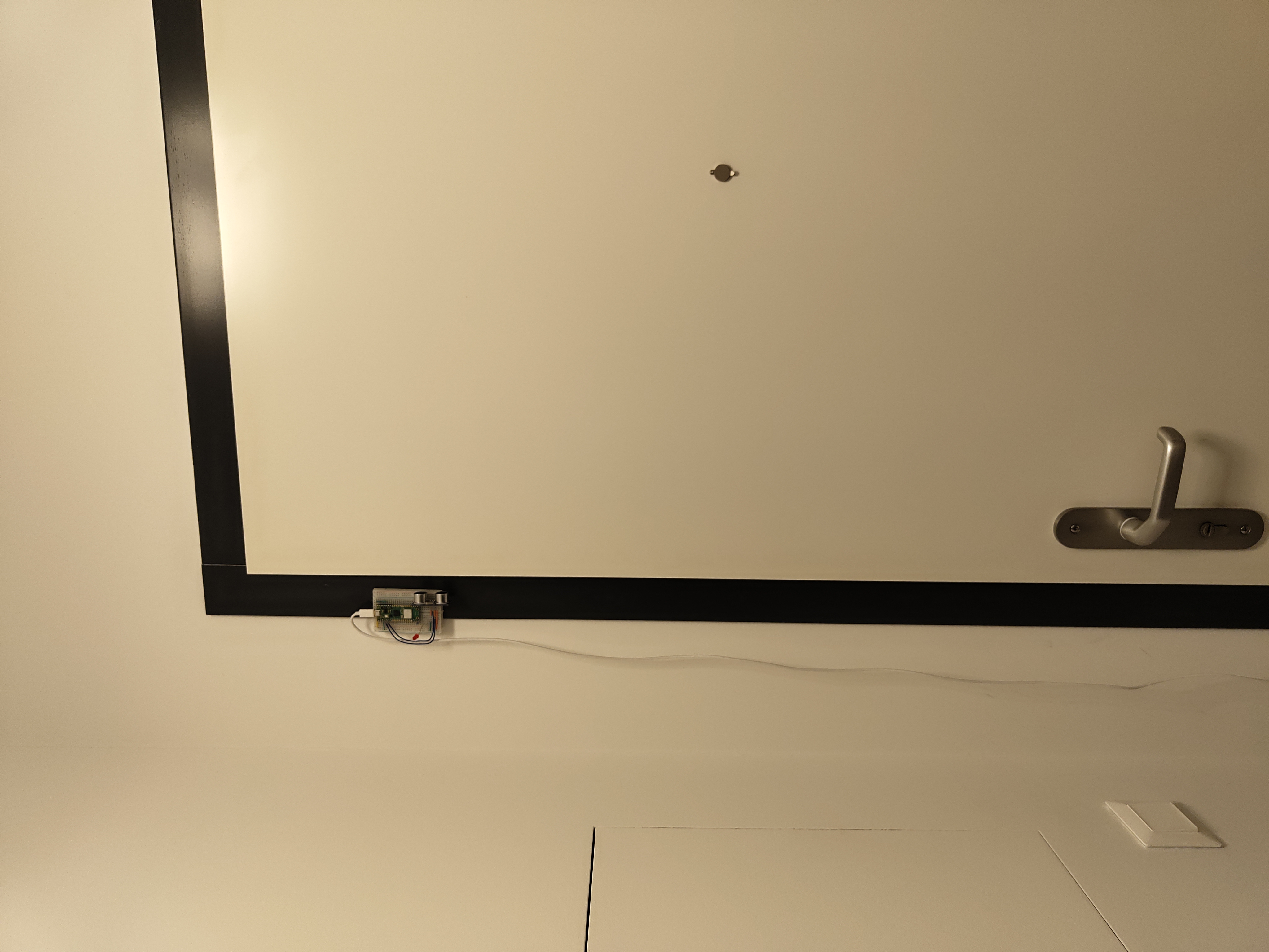 On door frame door alarm peripheral device on door frame